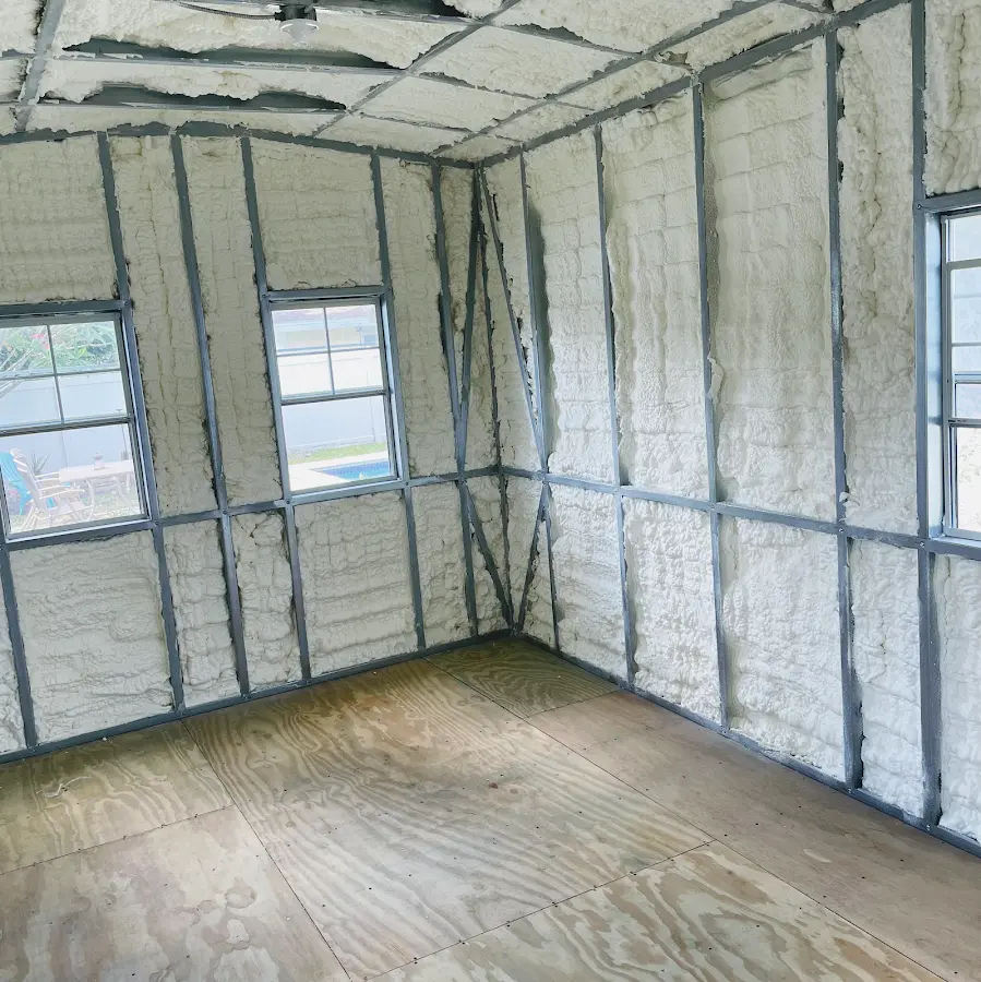 Closed-cell spray foam insulation applied to wall cavities in a residential project in Schaumburg